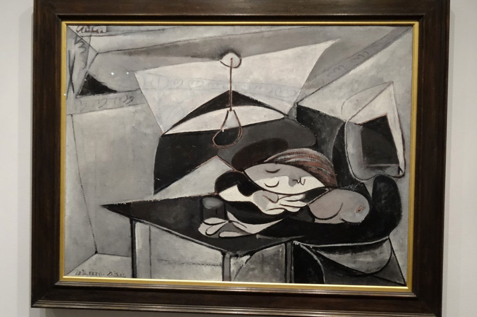 Femme endormie à une table de Pablo Picasso